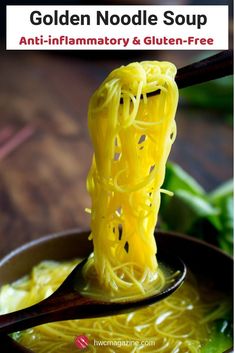 a close up of a spoon with noodles on it and the words golden noodle soup