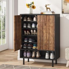 a shoe rack with several pairs of shoes in it