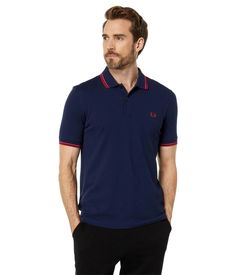 The iconic Fred PerryTM Slim Fit Twin Tipped Polo Shirt perfectly blends mod fashion and style. Featuring signature twin tipped stripes at the collar and cuffs plus a Laurel Wreath logo, this fitted cotton polo lets you showcase your trendsetting look for under 80 characters. Laurel Wreath Embroidery, Fred Perry Black Red, Laurel Wreath Logo, Fred Perry Polo Shirts, Twin Tips, Mod Fashion, Cotton Polo, Collar And Cuff, Top Shirt