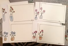 four cards with flowers in vases on them, one is empty and the other two are blank