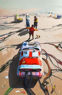 two people standing on the beach next to a train with many wires all over it