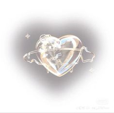 a heart shaped object with stars around it