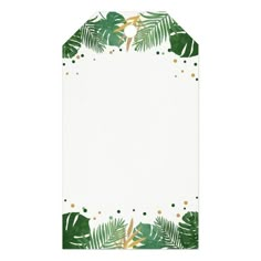 a white paper with green leaves and gold confetti on the edges, in front of a white background