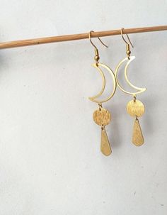 This pair is made of hypoallergenic brass parts. No Nickel and no Lead. . Light to wear and easy to combine. 🌿 . The item will arrive to you wrapped as a gift in a paper gift bag. . 》SHIPPING: If you need a tracking number for your order change the shipping option before checkout. 🌎 . If you have any questions please contact me, I usually respond quite fast 💌 . 》Please before ordering read my shop's announcement and check carefully the estimated delivery time Etsy gives you. I am only respons Unique Gold Moon Phase Earrings, Moon Phase Brass Earrings For Festival, Brass Moon Shaped Festival Earrings, Moon-shaped Brass Earrings For Festival, Festival Moon Phase Brass Earrings, Festival Moon-shaped Brass Earrings, Brass Moon Charm Earrings For Festival, Brass Earrings With Moon Charm For Festivals, Brass Festival Earrings With Moon Charm