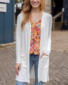 Front view of Ivory Casual Day Modal Cardigan Spring Cardigan, Ivory Cardigan, Spring Cardigans, Grace And Lace, Denim Dresses, Cardigan With Pockets, Modal Fabric, Versatile Wardrobe, Lightweight Cardigan