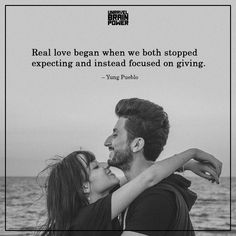 a man and woman embracing each other with the caption real love begins when we both stopped expecting and instead focused on giving