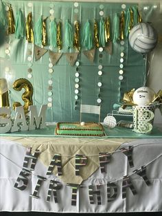 a birthday party with balloons, streamers and decorations