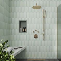 a bathroom with green walls and flooring next to a bathtub filled with soap