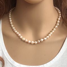 14k Solid Gold Clasp Pearl Necklace Length: 18 Inches Pearl Size: 6 Mm. Brand New With Box Classic Single Strand Necklace Gift, Classic Rose Gold Necklaces With Round Beads, High Luster Round Necklaces As Gifts, High Luster Round Necklaces For Gifts, High Luster Round Necklace, Classic Rose Gold Pearl Necklace, Classic Rose Gold Round Pearl Necklace, High Luster Pearl Necklace Gift, Pearl Size