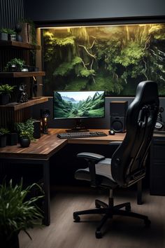 a computer desk with a monitor, keyboard and mouse in front of a painting on the wall