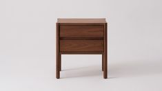 a small wooden table with two drawers on one side and an open drawer on the other