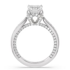 a white gold engagement ring with diamonds on it