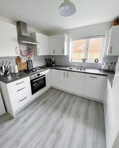 the kitchen is clean and ready for us to use in its new owner's home