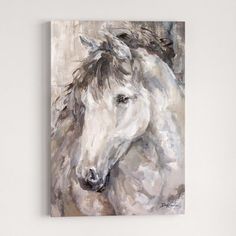 a painting of a white horse on a shelf