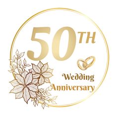 the 50th wedding anniversary sign with two gold rings and leaves on it's side