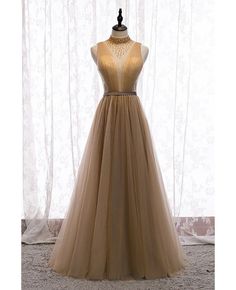 Buy flowy champagne tulle deep vneck evening prom dress with beaded high neck at affordable price online. Free shipping and pro custom service since 2009. Copper Prom Dress, High Neck Evening Dress, Champagne Evening Dress, Banquet Dresses, Elegant Prom Dresses, Backless Prom Dresses, فستان سهرة, Birthday Party Dress, Tulle Prom Dress