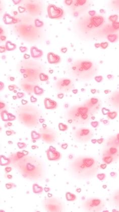 pink hearts are floating in the air on a white background with bubbles and sparkles