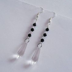 This listing is for one pair of Crystal Beaded Dangle earrings in bead color of choice. These stunning earrings catch light and are especially sparkly when dangling. Total length of earrings is approximately 2.5 inches including lead/nickel free silver toned alloy hooks. Earrings come in a colorful organza pouch. Gift box may be purchased if sending as a gift. May also include a note to recipient if desired (no extra charge). Custom requests are welcome. Please contact me for questions & req Earrings Prom, Prom Accessories, Organza Pouch, Bling Wedding, Jewelry Bridesmaid, Crystal Dangle Earrings, Rainbow Earrings, Rhinestone Designs, Beaded Dangle Earrings