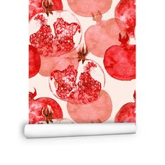 an apple and pomegranate pattern on a white background