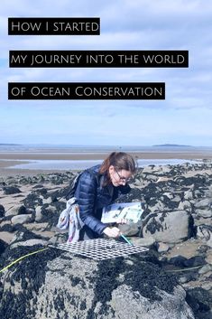 a woman sitting on top of a rock covered beach next to the ocean with text overlay reading how i started my journey into the world of ocean conservation