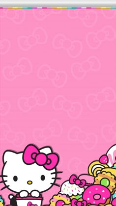 the hello kitty wallpaper is pink and has lots of cupcakes