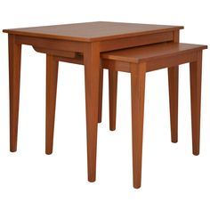 two wooden tables sitting next to each other