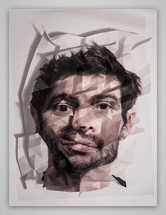 a man's face is shown through torn paper