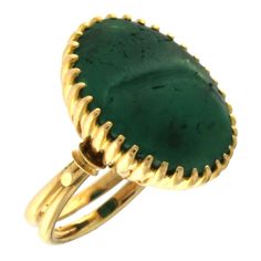 This classic 18K yellow gold ring showcases a striking green agate centerpiece, known for its rich color and natural allure. Crafted with precision, the gold band complements the vibrant hue of the agate stone, creating a statement piece of jewelry that radiates elegance. Total Ring Weight: 8.15 grams Green Agate Size: 16x21 mm US Size: 6.5 Ideal for those who appreciate the beauty of natural gemstones paired with fine gold, this ring adds a timeless elegance to any collection. Formal Green Cabochon Emerald Ring, Luxury Green Emerald Ring With Polished Finish, Luxury Green Intaglio Rings, Elegant Green Cabochon Emerald Ring, Elegant Green Emerald Cabochon Ring, Formal Green Emerald Ring With Polished Finish, Classic Green Cabochon Emerald Ring, Yellow Gold Emerald Cabochon Ring, Elegant Green Intaglio Ring