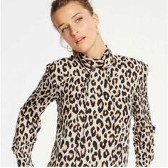 Nwt $89 Ann Taylor Cheetah Spotted Bow Blouse Top Long Sleeve Dressy Work Sz Xs New With Tags 100% Polyester Machine Wash Tie Bow In Front Or Back Length:27” Chest Across:18” So Nice! Bg22 Fitted Leopard Print Blouse For Work, Shirred Sleeve, Bow Blouse, Tie Bow, So Nice, Blouse Top, Black And Tan, Mock Neck, Ann Taylor