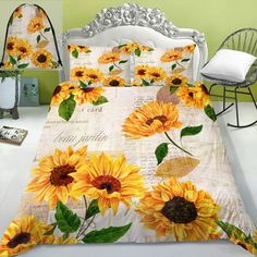 a bed with yellow sunflowers on it