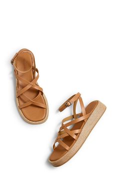 Woven trim highlights the earthy platform sole of this strappy, vacation-ready sandal. Adjustable ankle strap with buckle closure; hidden elastic inset Leather upper and lining/rubber and synthetic sole Imported Platform Slingback Sandals For Vacation, Vacation Platform Slingback Sandals, Vacation Slingback Platform Sandals, Summer Sandals With Ankle Strap, Summer Strappy Platform Sandals, Platform Ankle Strap Slingback Sandals For Beach, Ankle Strap Platform Slingback Sandals For Beach, Summer Leather Platform Sandals, Strappy Platform Beach Sandals