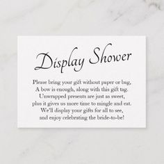 a white business card with the words display shower written in black on it