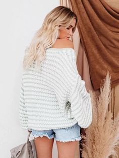 You can never go wrong with your styling when it's with our striped knit boho sweater. Give your aesthetics a visual treat each time you pick our luxurious striped knit boho sweater for a show-stopping look. This exquisite boho pullover sweater has a deep V-neck, leaving enough skin surface to flaunt some dazzling bohemian jewelry on the neck. The baggy sleeves add a flowy dimension to the overall silhouette, adding more appeal to this top. Striped pattern Full lantern sleeves V neck Computer kn Chic Striped Knit Sweater, Striped Long Sleeve Soft Knit Sweater, Striped Long Sleeve Knit Top For Fall, Trendy Oversized Striped Sweater, Spring Striped Soft Knit Sweater, Oversized Striped Soft Knit Top, Trendy Striped Knitted Sweater, Striped Soft Knit Sweater For Fall, Cozy Striped Ribbed Tops