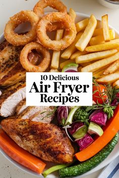 an air fryer meal on a plate with onion rings, carrots and onions