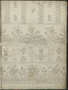 an old book with embroidered designs on the front and back pages, in black ink