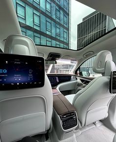 the interior of a car with an electronic display