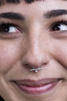 Unique nose ring septum made of sterling silver. Available also in 14k white/yellow gold and gold plated silver. This best seller tribal septum is bold and beautiful, and it's inspired by the Indian nose rings and tribal shapes in a minimalist style. Can be also worn as a regular hoop earring, helix piercing or tragus. Fits men and women styles. The septum in the photo is 20 gauge. Availability also in 16 gauge (1.2 mm). ----------------------------------------------------- > Hand made septum Internally Threaded Minimalist Septum Ring, Minimalist Hypoallergenic White Gold Septum Ring, Minimalist Internally Threaded Sterling Silver Septum Ring, Hypoallergenic White Gold Septum Ring In Sterling Silver, Tiny Silver Minimalist Septum Ring, Minimalist White Gold Nose Ring For Gift, Nickel-free White Gold Sterling Silver Nose Rings, Minimalist White Gold Nose Rings As Gift, Minimalist White Gold Sterling Silver Nose Rings