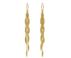 With their dramatic cascade and movement, these Sia Taylor earrings are a long drop of hand sculpted 18K yellow gold seeds. They hang along three verticals chain which each hang from the 18K yellow gold ear wires. total length : 2 7/8"width : 1/4"18K yellow gold ear wires