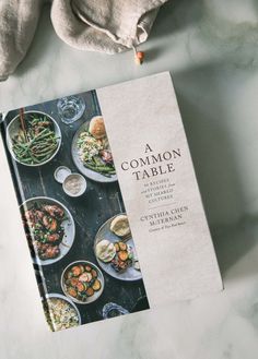 a cookbook sitting on top of a table