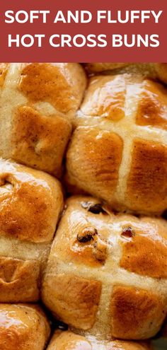 soft and fluffy hot cross buns with raisins on top