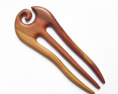 Overall length: 6 inches (15 cm) Top wide: 1,9 inches (4,8 cm) Hand Carved Wooden Hair Fork From the Plum Wood. This hair fork is very smooth and easily slide into hair while holding it perfectly in shape. The wood has been treated with natural oil. To finalize the hair fork, it is polished to a high shine. Leaving you with not only a useful and functional tool but also a beautiful decoration for your hair. Great for all hair types: straight, wavy, curly. Works well with shoulder-length hair to Hair Accessories Bun, Stick Wood, Hair Fork, Hair Stick, Very Long Hair, Shoulder Length Hair, Hair Sticks, Hair Pin, Shoulder Length