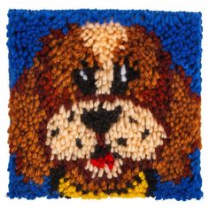 a close up of a rug with a dog's face painted on the front