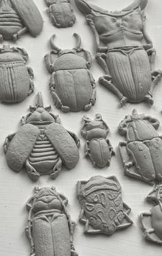 some very cute little bugs cookies on a table