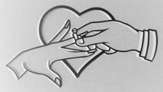 two hands holding each other over a heart