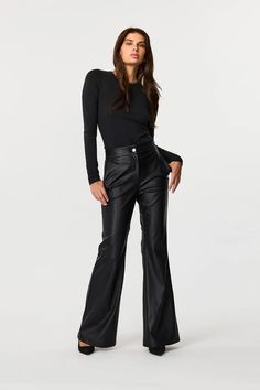 Make a bold statement with the Gaia vegan leather flare pants. Crafted from sustainable, high-quality vegan leather, these tailored dress pants offer a sleek and modern silhouette. With a high-waisted design that flatters your figure, these flare pants are perfect for both pant suits and standalone looks. Comfortable yet striking, they’re ideal for both formal events and chic casual outings, ensuring your wardrobe is stylish and eco-conscious. Sleek Flare Pants For Fall, Fitted Flare Leather Pants For Work, Flare Leather Bottoms For Work, Leather Flare Bottoms For Work, Chic Flare Leather Pants, Chic Flared Leather Pants, Flared Leather Bottoms For Work, Sleek Leather Pants For Evening In Fall, Elegant Flare Leather Pants For Fall