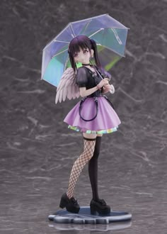 a figurine is holding an umbrella and posing for the camera