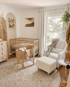 a baby's room is decorated in neutral colors