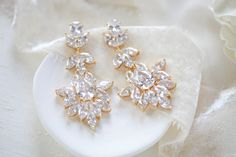 Large cubic zirconia rose gold bridal statement earrings - AVERY – Treasures by Agnes Glamorous Rose Gold Chandelier Earrings, Glamorous Rose Gold Cubic Zirconia Chandelier Earrings, Statement Earrings Wedding, Bridal Statement Earrings, Silver Crystal Earrings, Crystal Bridal Earrings, Earrings Aesthetic, Rose Gold Bridal, Cubic Zirconia Earrings