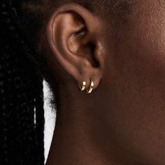 Katerina Double hoop earring, featuring the versatility of a two hole piercing, without the piercing. One larger hoop fits comfortably into a piercing, whilst the smaller accompanying hoop works as an adjustable ear cuff, sold as a pair. 18ct Vermeil Gold on Sterling Silver Measurement: Smaller hoop 0.39"(10mm) / Larger hoop 0.5"(13mm) Yellow Gold Pierced Cartilage Earrings, Yellow Gold Huggie Cartilage Earrings, Everyday Small Hoop Wrap Earrings For Pierced Ears, Tarnish Resistant Huggie Ear Cuff, Everyday Small Hoop Wrap Earrings, Versatile Everyday Hoop Earrings, Minimalist Tarnish-resistant Wrap Earrings, Small Hoop Ear Cuff With Ear Wire, Adjustable Small Hoop Wrap Earrings