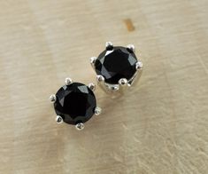 These are a stunning pair of Black Spinel from Thailand set in Sterling Silver! These gems have the look, luster, and appeal of Black Diamonds but does not carry the hefty price tags!! Spinel is a rarer and underrated gemstone on the market that comes in a large variety of colors, blues, purples, reds, pinks, grays, green and black while usually never treated. Spinel is one of August's Birthstones! These nicely sized 6mm Round Black Spinel weigh 1.995cts will go great with any style or occasion Indicolite Tourmaline, Tourmaline Earrings, Black Diamonds, Black Spinel, Price Tags, August Birth Stone, Black Tourmaline, Black Diamond, Gemstone Pendant